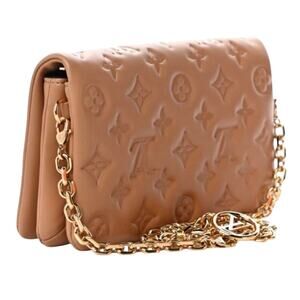 Louis Vuitton Pochette Coussin in Camel Leather